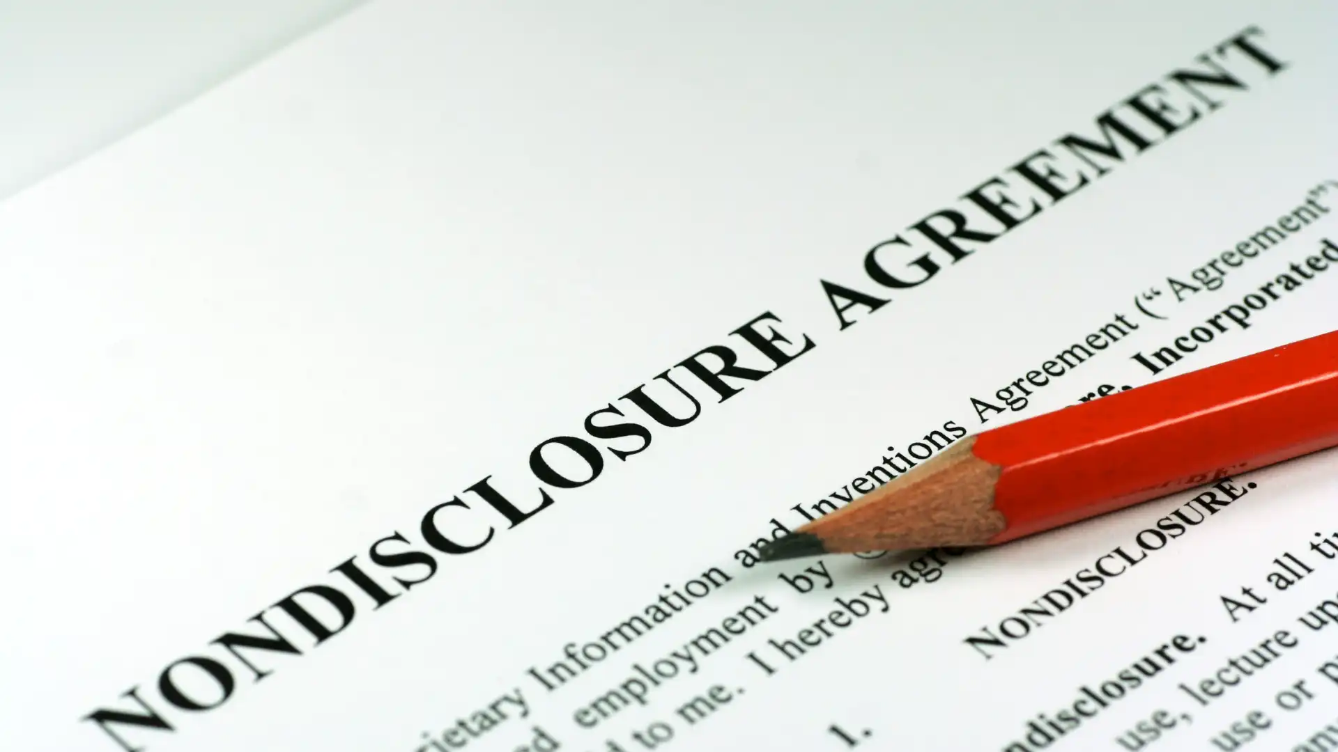 Disclosure agreement document with pencil.